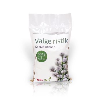 Valge ristikupakend tekstiga 'Valge Ristik' ja muruseemne, netokaaluga 300 g, kaunistatud looduslike lillekujunditega.