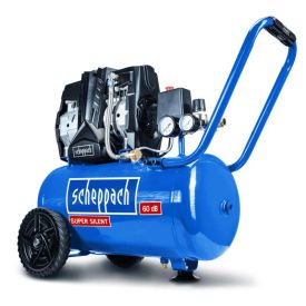 Sinine õlivaba õhukompressor ratastega, silindrilise mahutiga ja horisontaalse käepidemega. Seadmel on manomeetrid ja juhtnupud kompressori ülaosas.