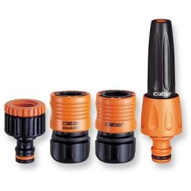 Erinevad voolikuliitmikud musta ja oranži värvikombinatsiooniga, sealhulgas ühendused ja düüsid.