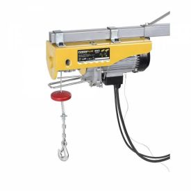 Kollane elektritalu koos mootoriga, metallkonksu ja trossiga, mille küljes on juhtmekomplekt. Seade on kinnitatud metallraamile, mille korpuse peal on must ja kollane infokleebis.